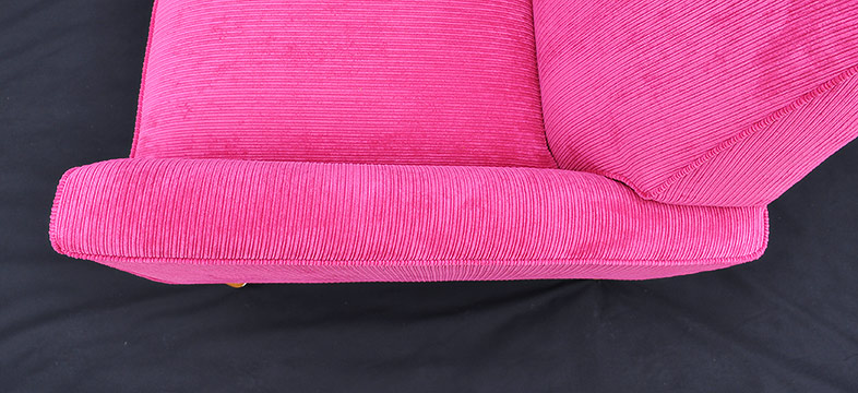 Re-upholstered armchair arms detail