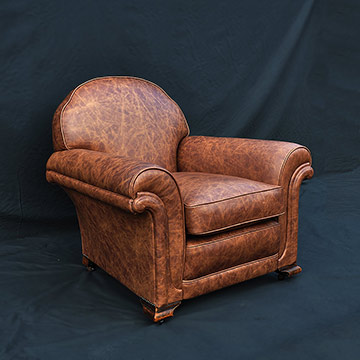 Club chair in tan leather