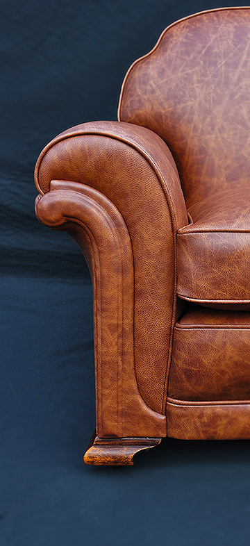 Leather club chairs arm detail
