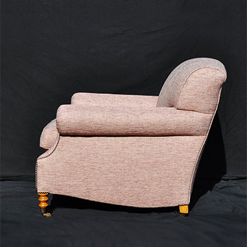 Reupholstered classic armchair