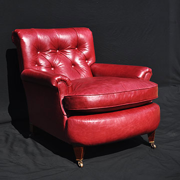 Howard and Sons reupholstered leather armchair