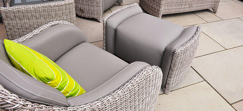 Outdoor armchair and footstool