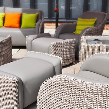 Outdoor lounge seating area, various furniture pieces reupholstered