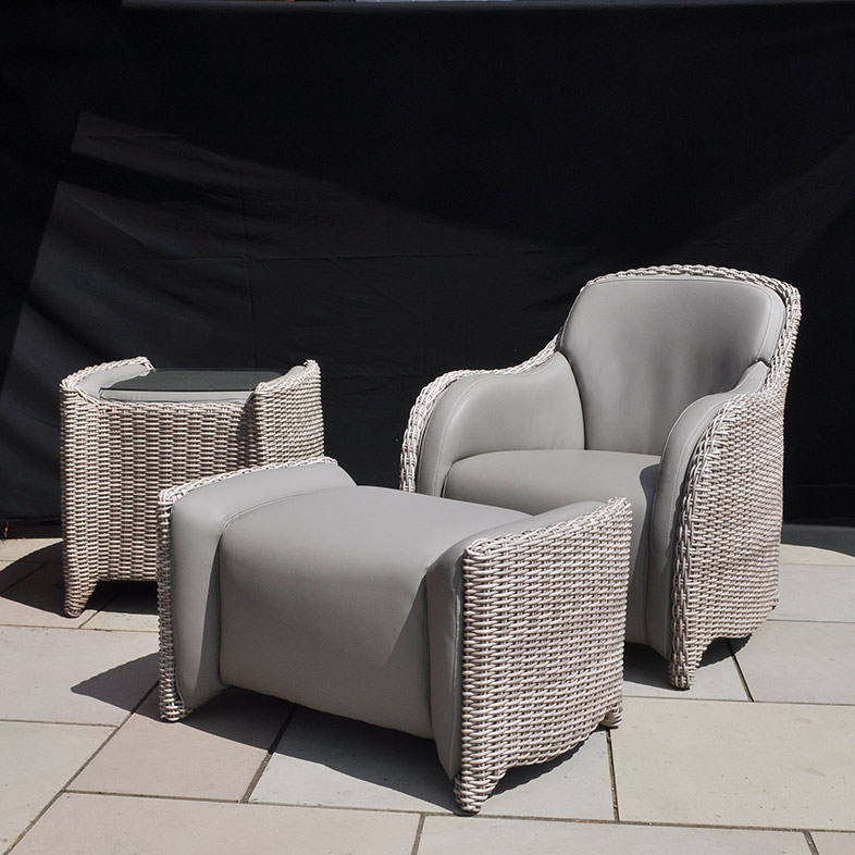 Outdoor armchair, side-table and foot stool in faux leather