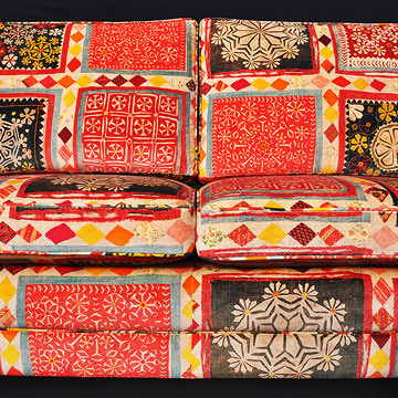 Distruptive pattern matching upholstered sofa