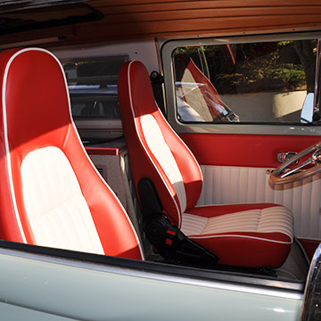 Original Porsche driver and passenger seats in VW T2 trimmed